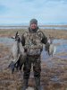10-08- Tom with 3 ducks and 2 honkers- Alamosa NWR[1].JPG